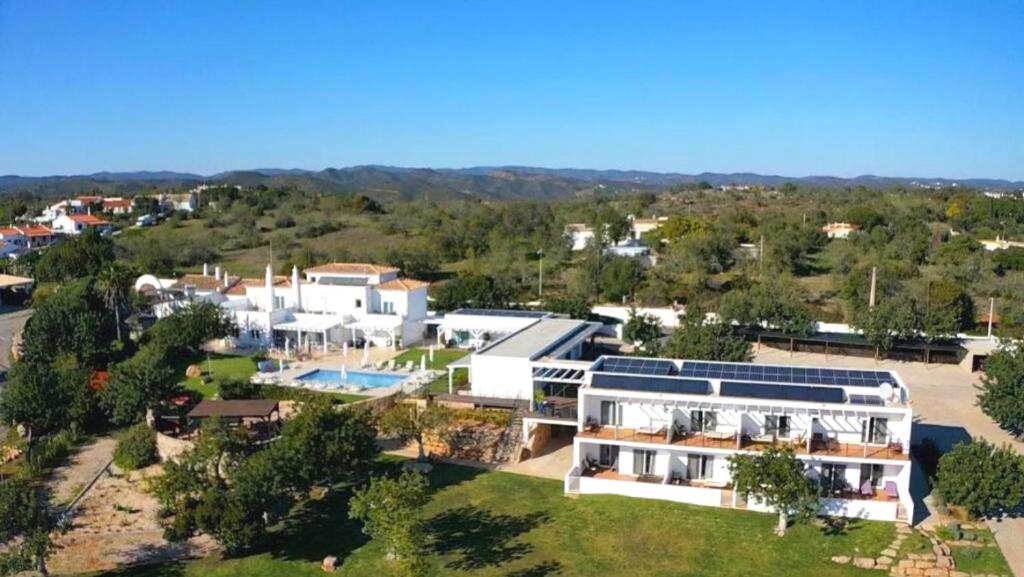 an aerial view of a large house with a yard at Casa Branca in Tavira