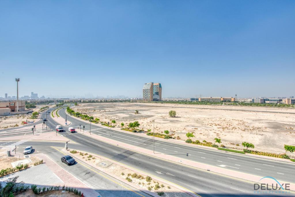 Nespecifikovaný výhled na destinaci Dubaj nebo výhled na město při pohledu z apartmánu