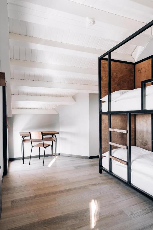 Voodi või voodid majutusasutuse Alaïa Lodge toas