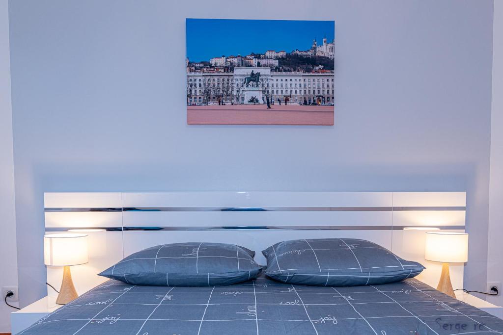 Postel nebo postele na pokoji v ubytování Le Clos Jaurès/Lyon-Eurexpo/Parc OL