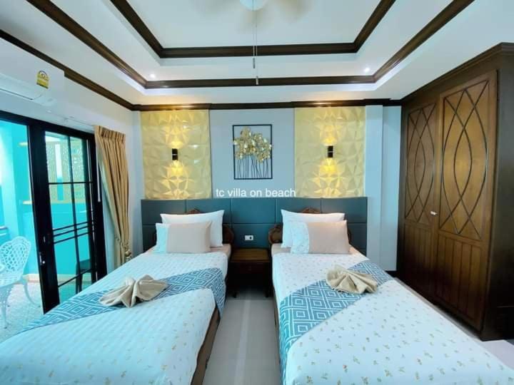 Letto o letti in una camera di TC villa on beach