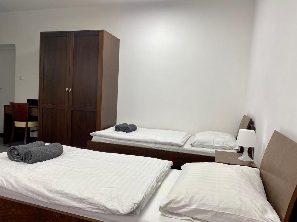Posteľ alebo postele v izbe v ubytovaní Astra Katowice - Aparthotel