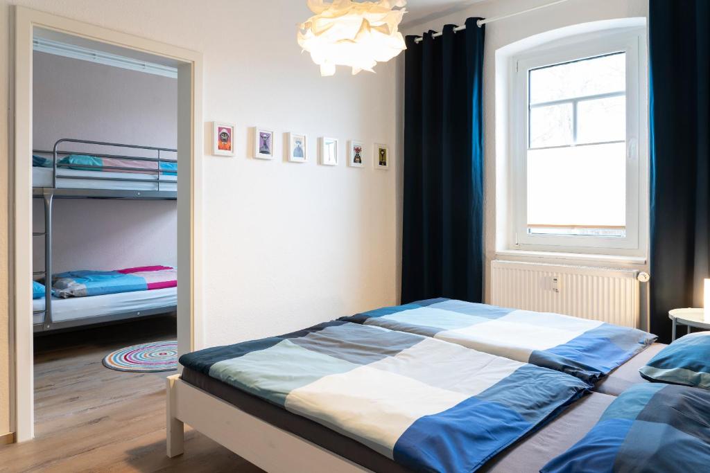 Postel nebo postele na pokoji v ubytování Harzquartier