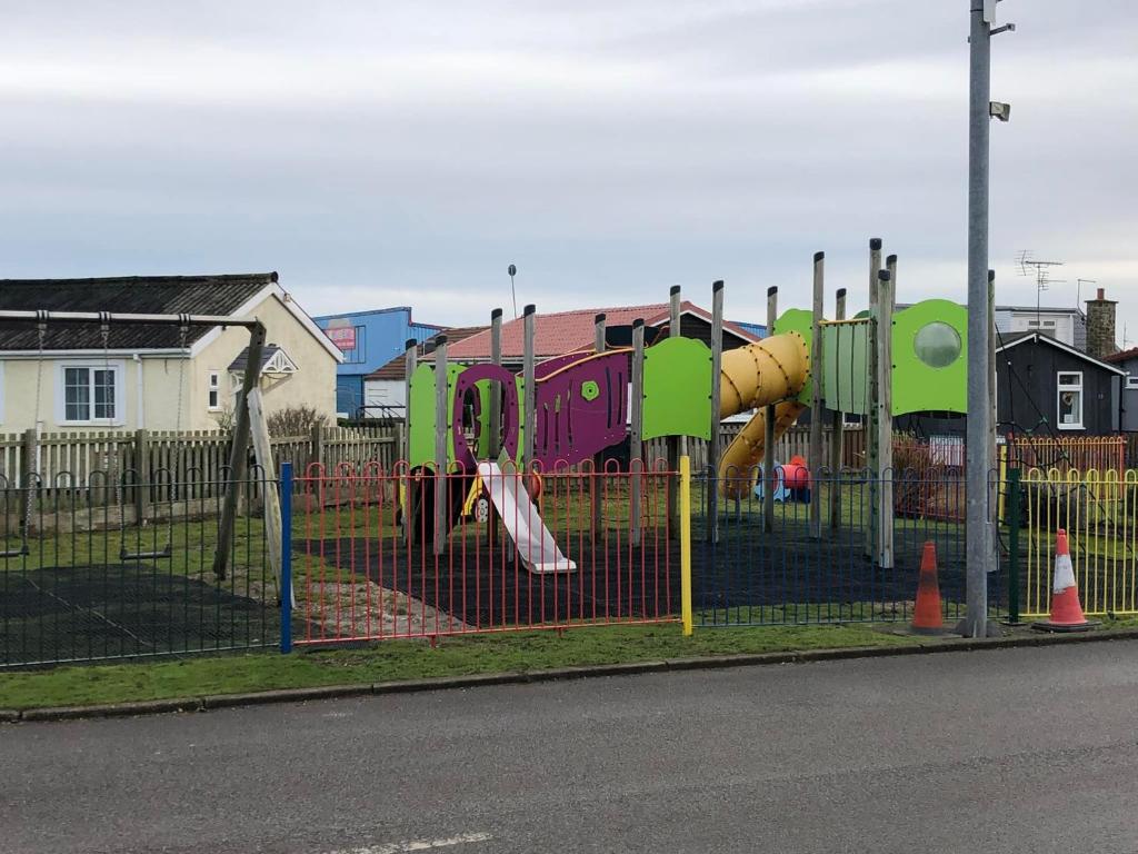 a park with a playground with a play equipment at Field View in Bridlington