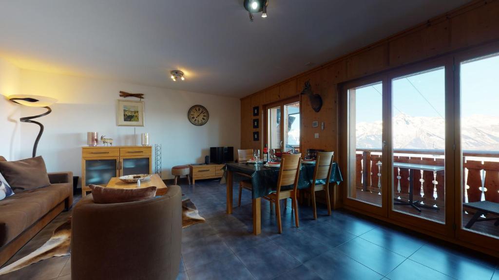 Posezení v ubytování Hauts de Veysonnaz SAUNA & VIEW apartments