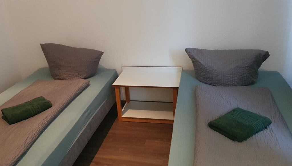 Postel nebo postele na pokoji v ubytování Hotel Berkut