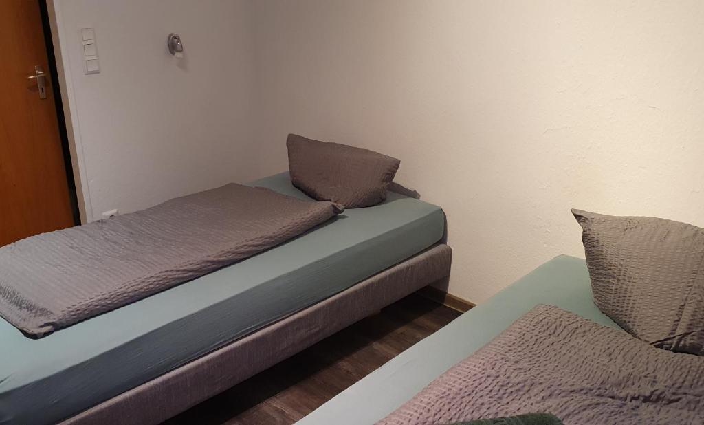 Postel nebo postele na pokoji v ubytování Hotel Berkut