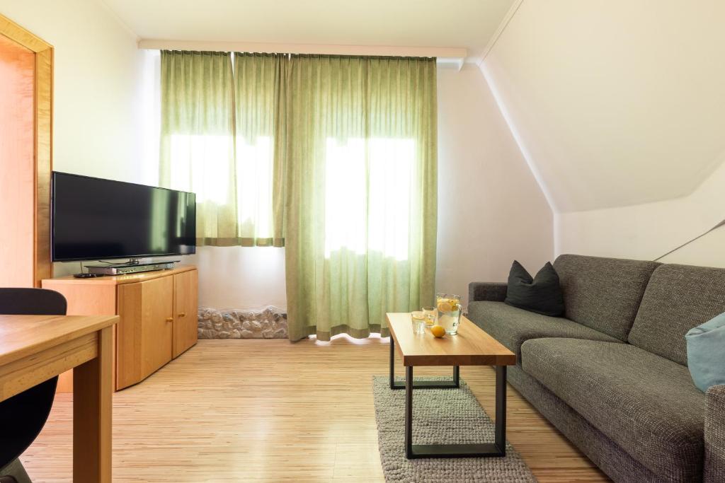 TV a/nebo společenská místnost v ubytování KASSNHOF - Urlaub in den Bergen