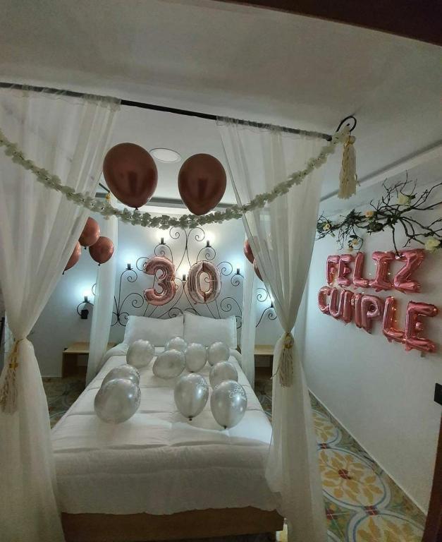 Postel nebo postele na pokoji v ubytování Hotel Bahia Del Faro