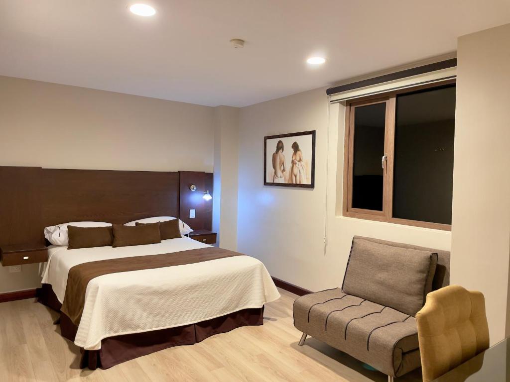 Voodi või voodid majutusasutuse Hotel Patrimonio toas