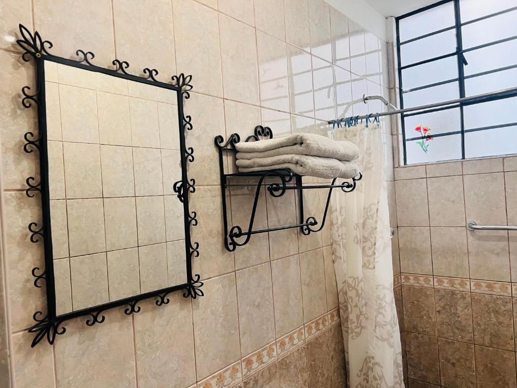 Koupelna v ubytování Hostal Qorichaska