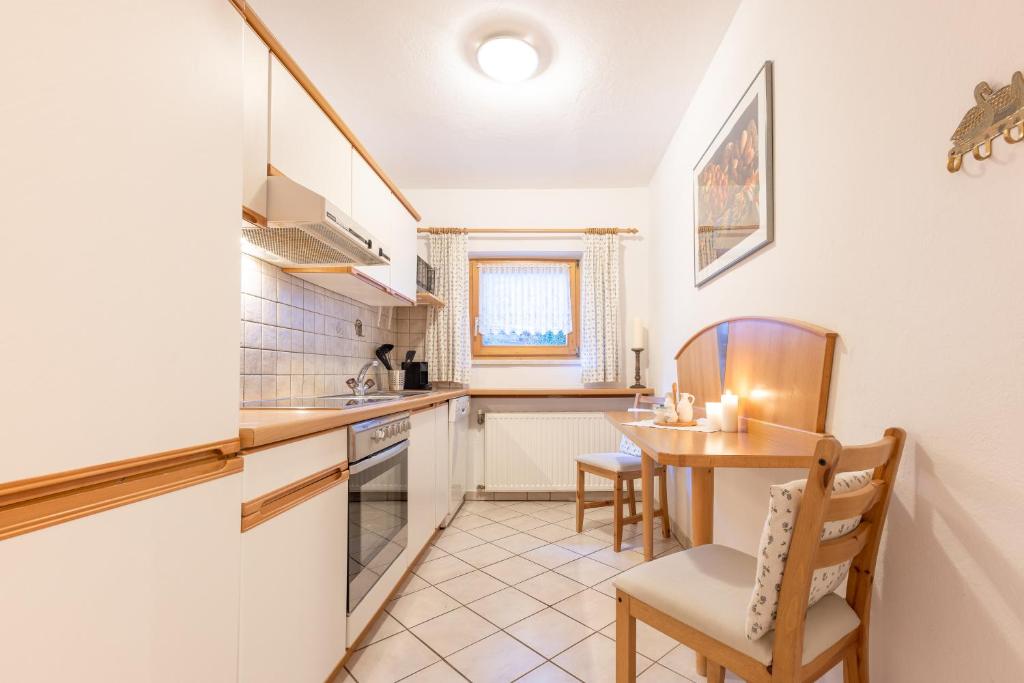 Kuchyň nebo kuchyňský kout v ubytování KASSNHOF - Urlaub in den Bergen