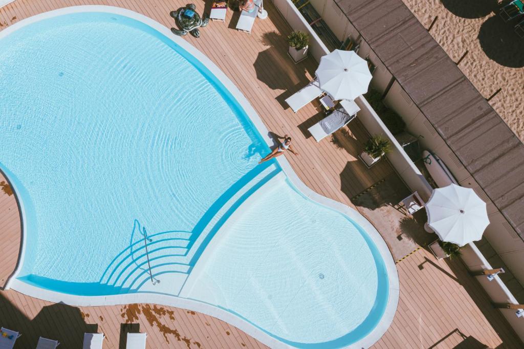 The swimming pool at or close to Nautilus Family Hotel
