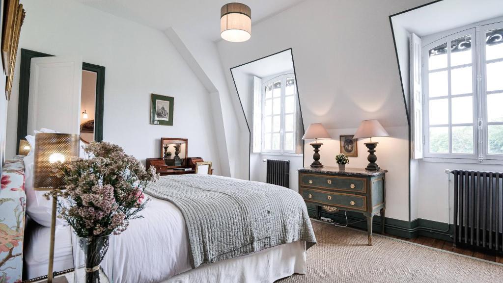 מיטה או מיטות בחדר ב-Le Domaine de Courances - Pierres d'Histoire