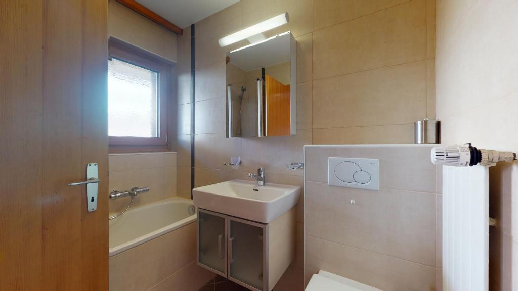 Koupelna v ubytování Greppons COSY & MOUNTAIN apartments by Alpvision Résidences