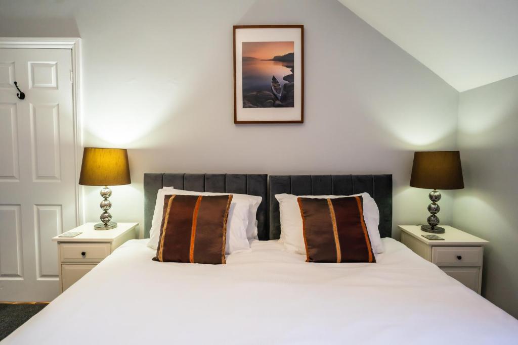 Łóżko lub łóżka w pokoju w obiekcie Eden Vale - City Centre By Horizon Stays