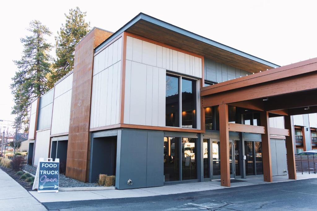 a building with a sign in front of it at Waypoint Hotel in Bend