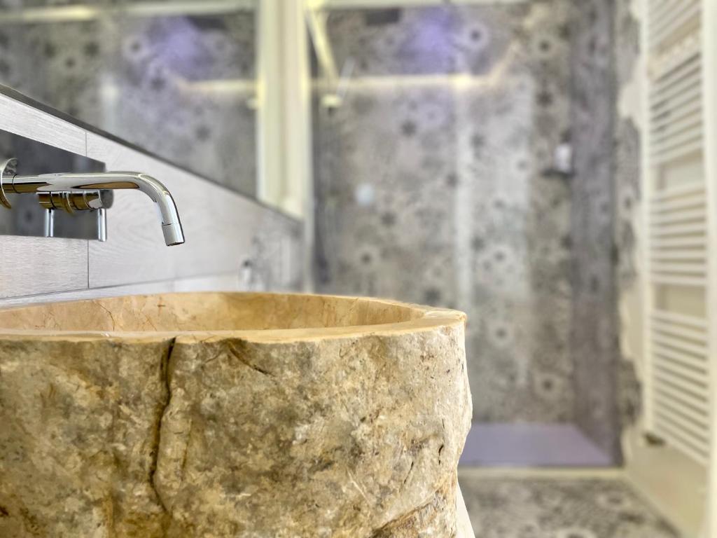 Kúpeľňa v ubytovaní Mariarosa Suites