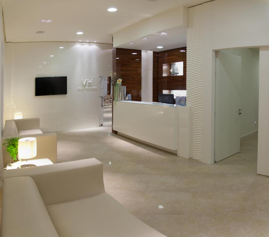 TV a/nebo společenská místnost v ubytování Hotel Vespucci