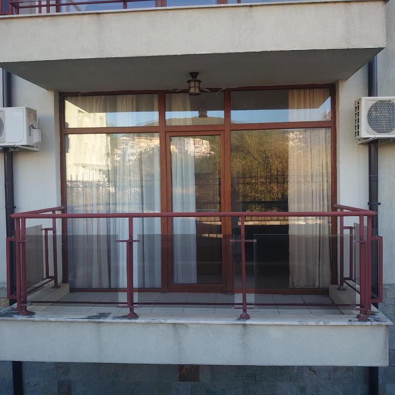 A balcony or terrace at Helios 350m from the beach