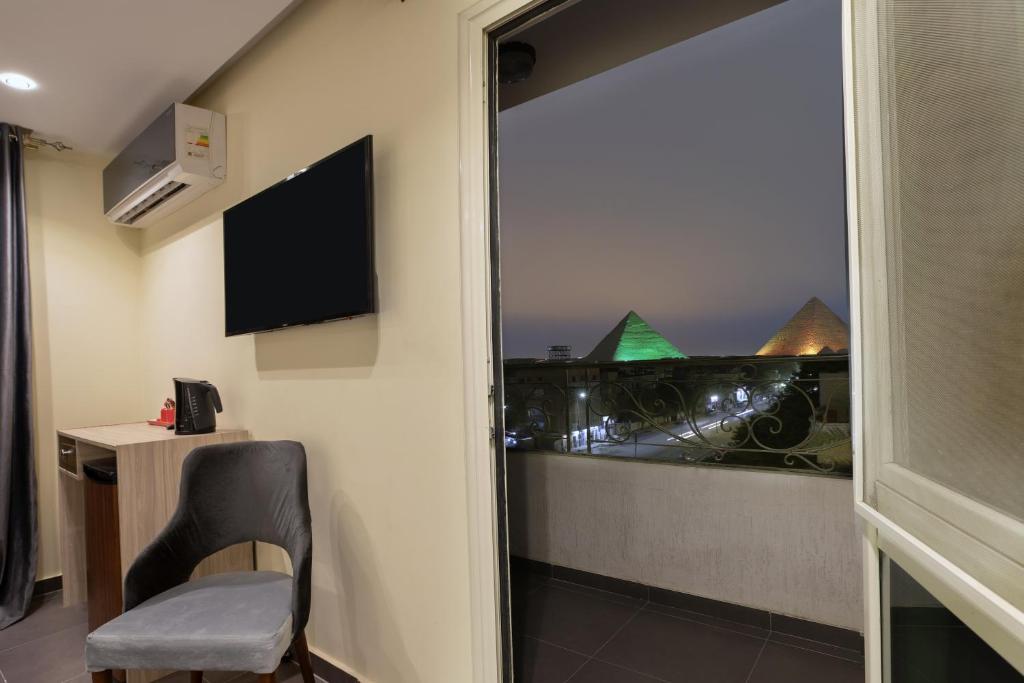 TV a/nebo společenská místnost v ubytování Brothers Pyramids View