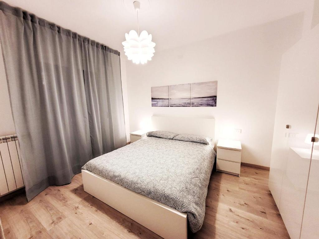 Posteľ alebo postele v izbe v ubytovaní A due passi dal mare - Appartamento per vacanze (cod. CITRA 008059-LT-0372)