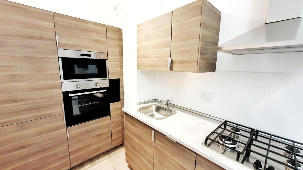 Kuchyňa alebo kuchynka v ubytovaní A due passi dal mare - Appartamento per vacanze (cod. CITRA 008059-LT-0372)