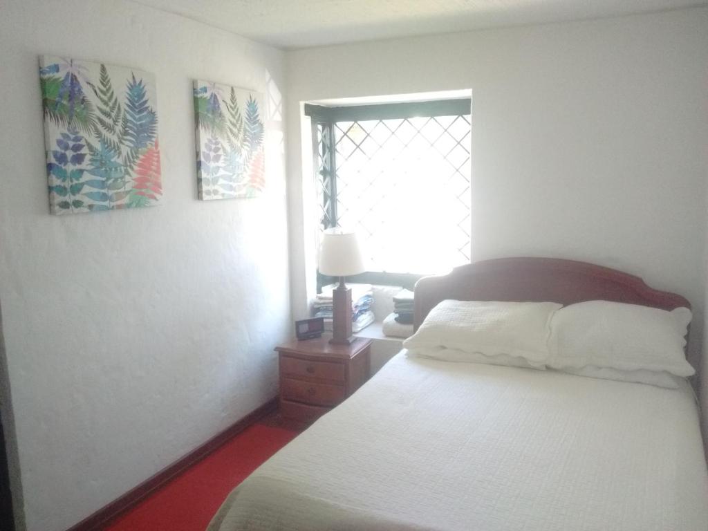 Postel nebo postele na pokoji v ubytování Casa Turística Camitas Inn