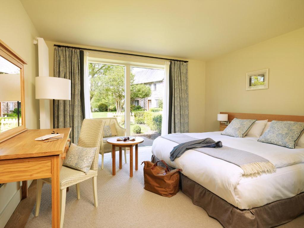 Voodi või voodid majutusasutuse Ard na Sidhe Country House Hotel toas