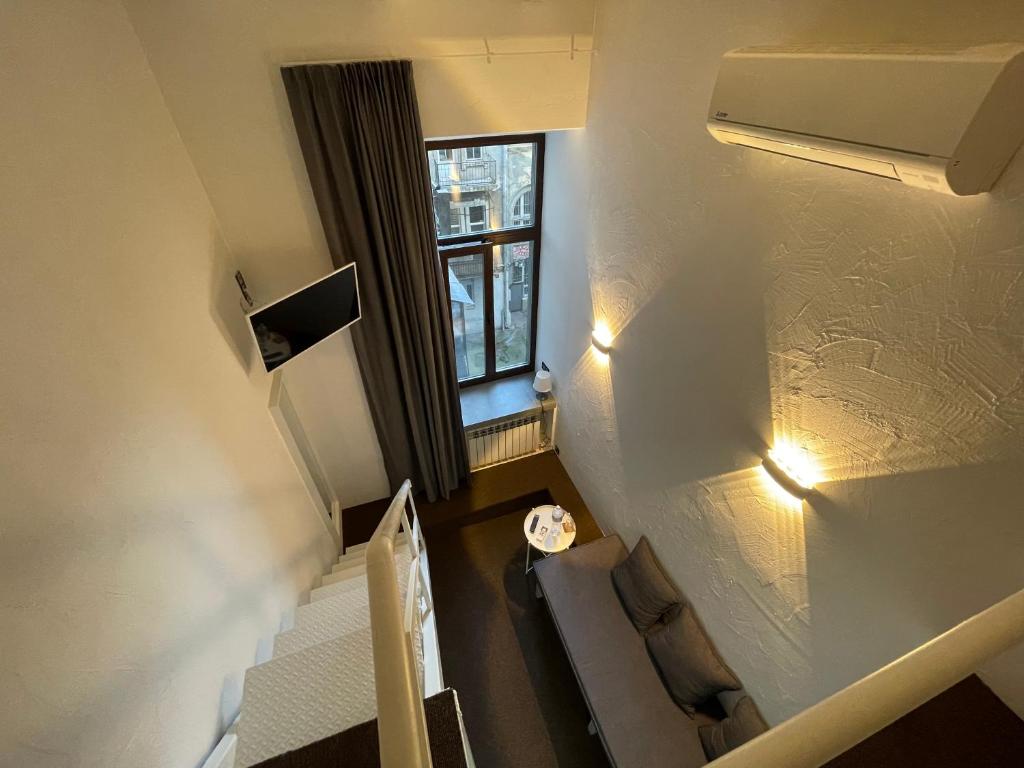 TV a/nebo společenská místnost v ubytování Lift Hotel Boutique - Derybasivska
