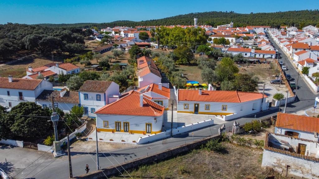 an aerial view of a town with houses at Páteo Lima in Évora
