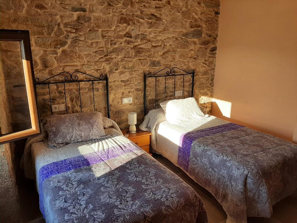 Postel nebo postele na pokoji v ubytování Casita de norma