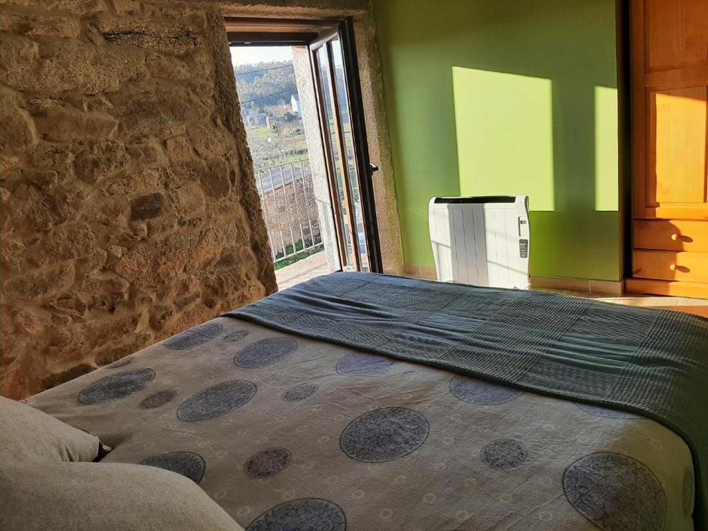 Postel nebo postele na pokoji v ubytování Casita de norma