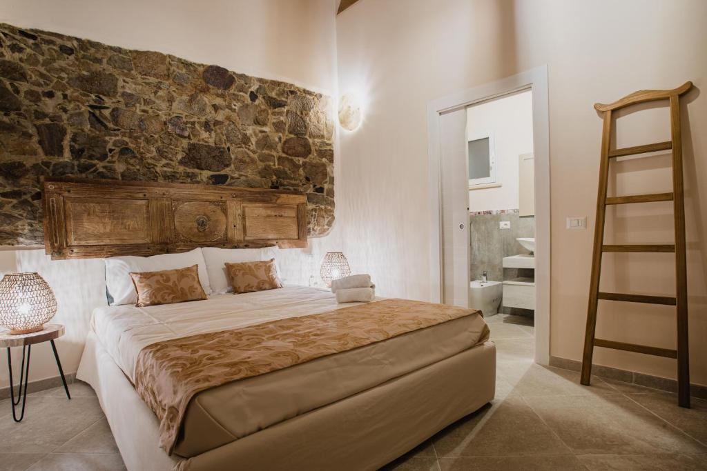 Posteľ alebo postele v izbe v ubytovaní Moon's Tower suite&rooms