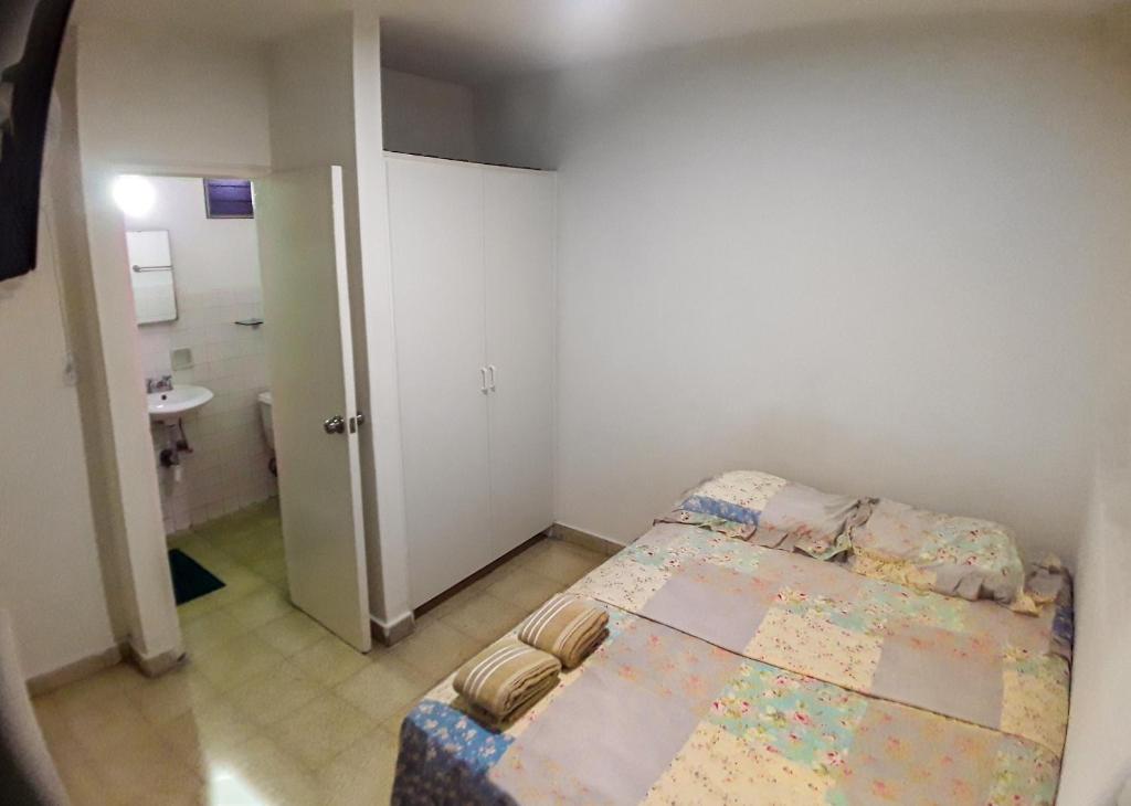 Postel nebo postele na pokoji v ubytování Habitaciones privadas en un departamento encantador