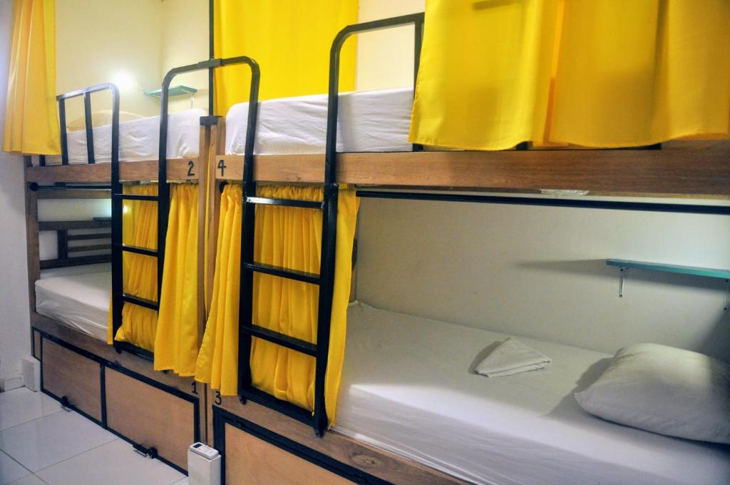 Litera o literas de una habitación en Bona Vida Hostel