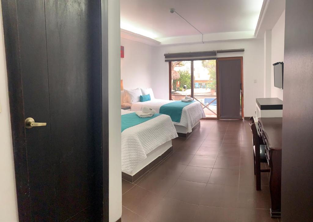 Hosteria Punta Blanca - Habitación Triple De Lujo