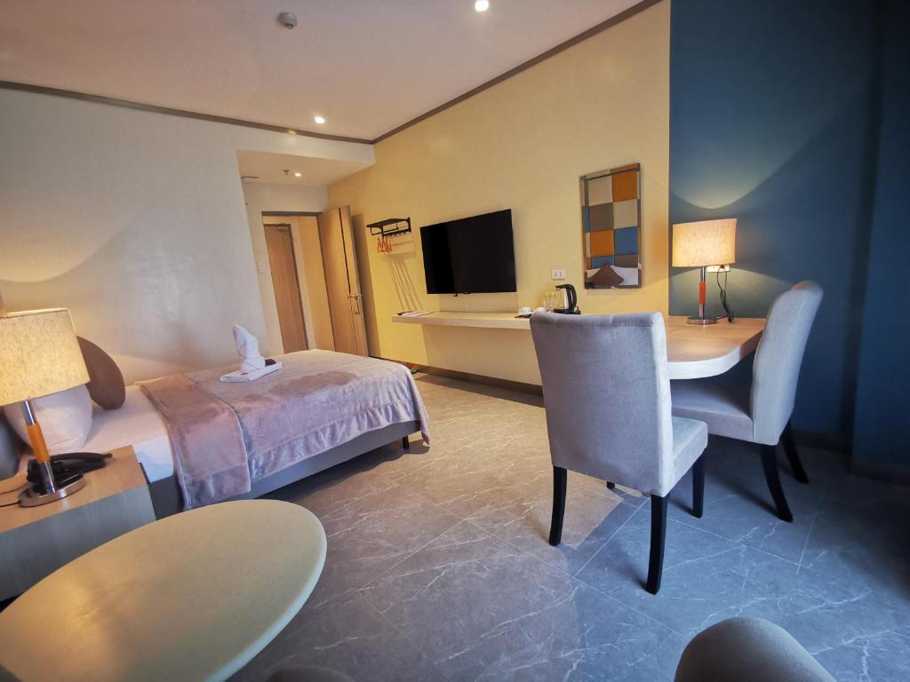 TV a/nebo společenská místnost v ubytování Yes Hotel Pandi Bulacan