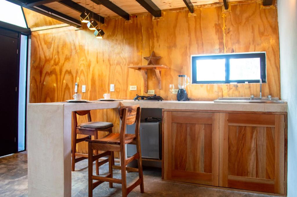 Kuchyň nebo kuchyňský kout v ubytování Xtambaa Cabins & Spa Only Adults