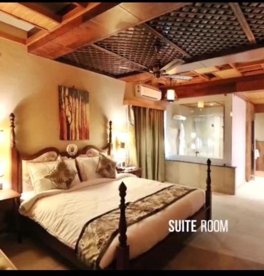 Postel nebo postele na pokoji v ubytování Hotel Sonar Bangla Sundarban