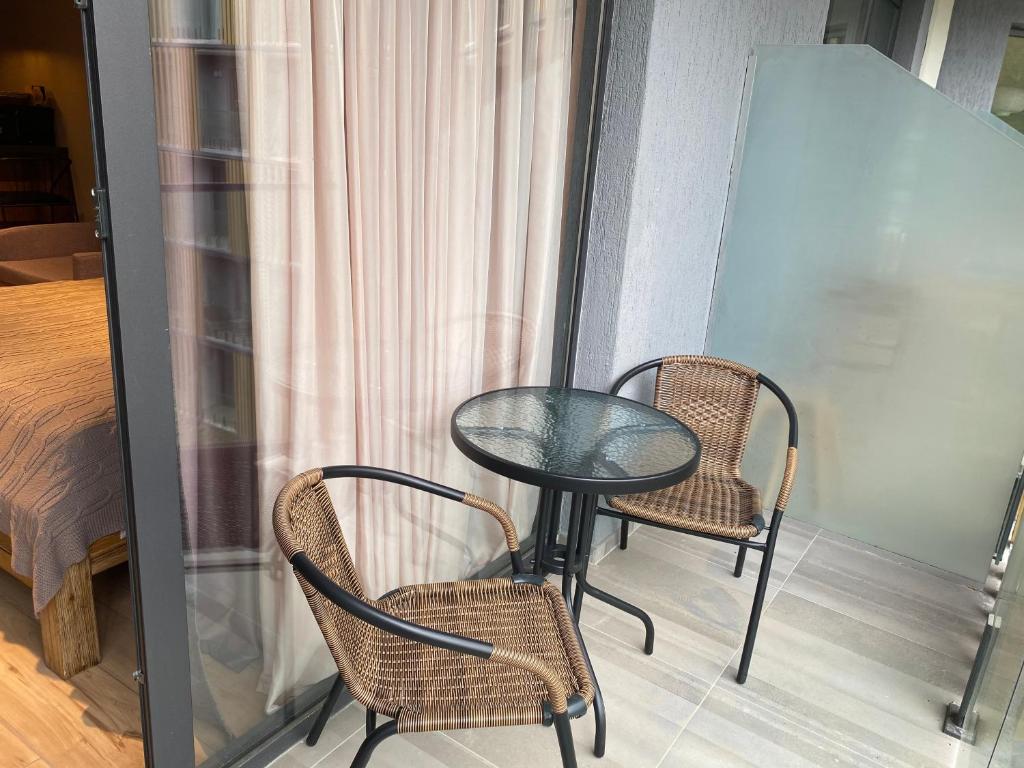 Postel nebo postele na pokoji v ubytování Atrium Apt. 403