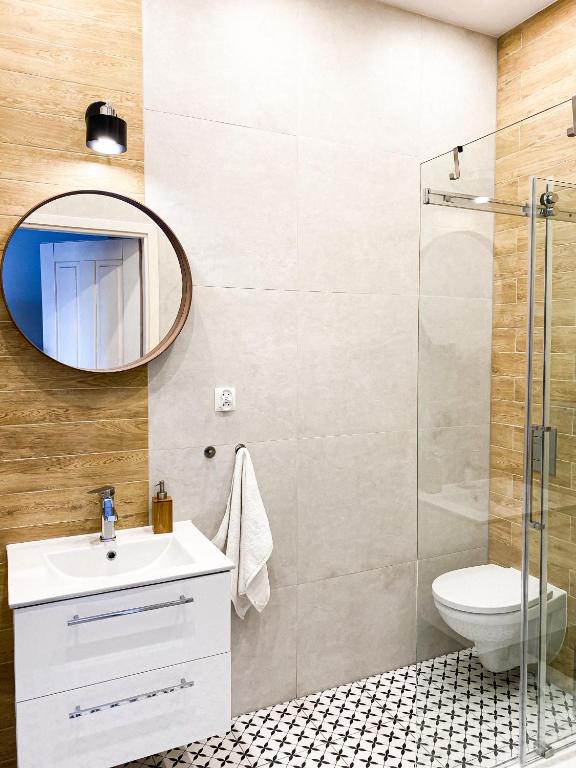 Kúpeľňa v ubytovaní Apartamenty Lobeliowy Port