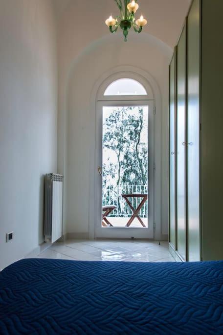 Postel nebo postele na pokoji v ubytování Villacore Capri
