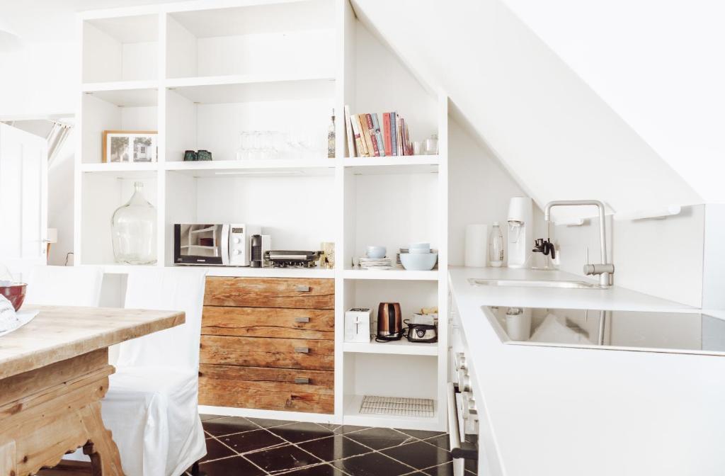Kuchyň nebo kuchyňský kout v ubytování WINEHOUSE Living