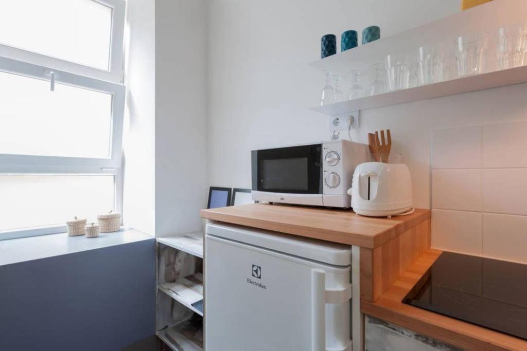 Kuchyňa alebo kuchynka v ubytovaní Modern stylish 2 bedroom holiday apartment