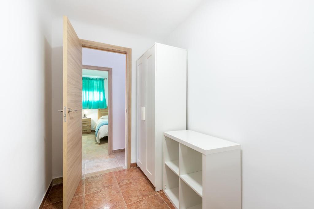 Postel nebo postele na pokoji v ubytování Casa Pepe junto al mar