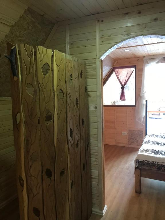 Postel nebo postele na pokoji v ubytování Садиба 2 Підкова чан та сауна