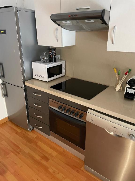 Kuchyňa alebo kuchynka v ubytovaní Tarraco Apartment