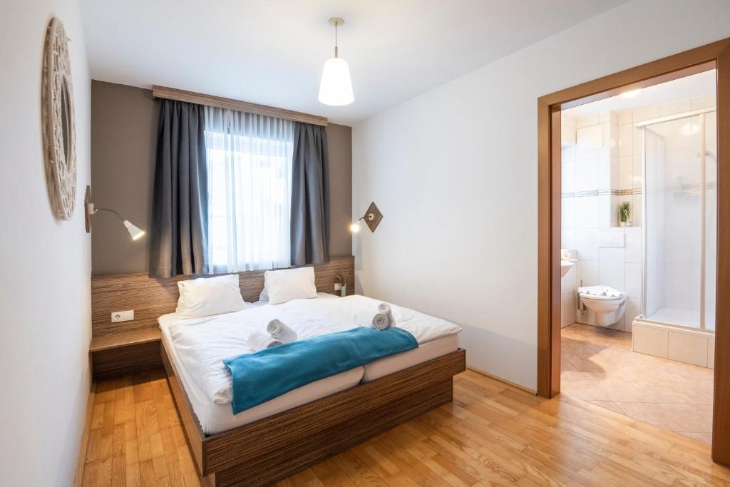 Postel nebo postele na pokoji v ubytování Haus Obauer by AlpenTravel