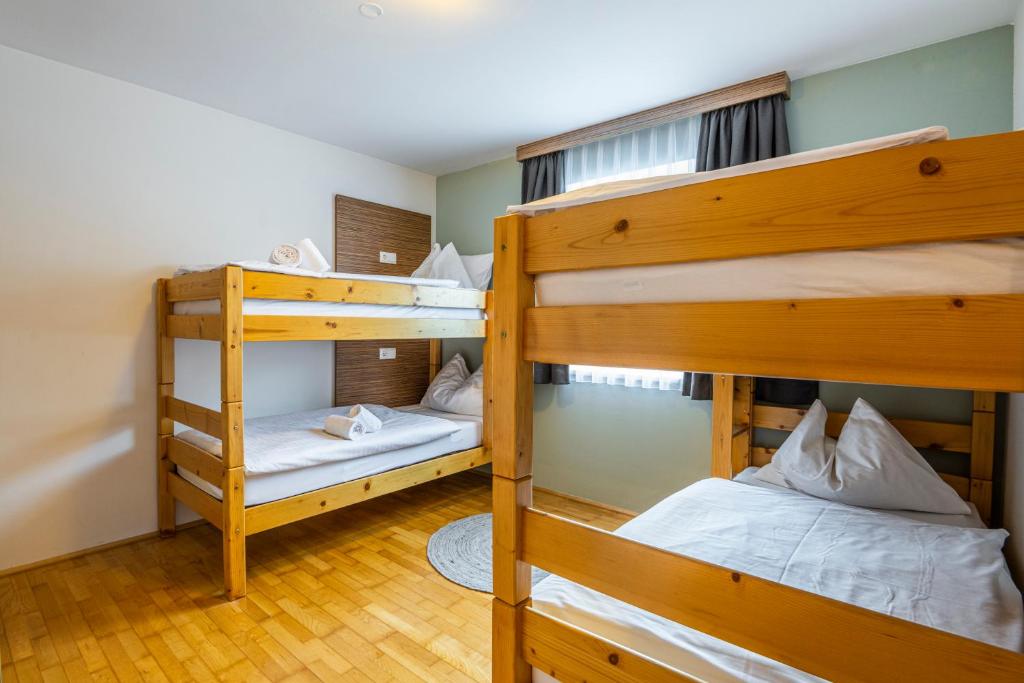 Postel nebo postele na pokoji v ubytování Haus Obauer by AlpenTravel